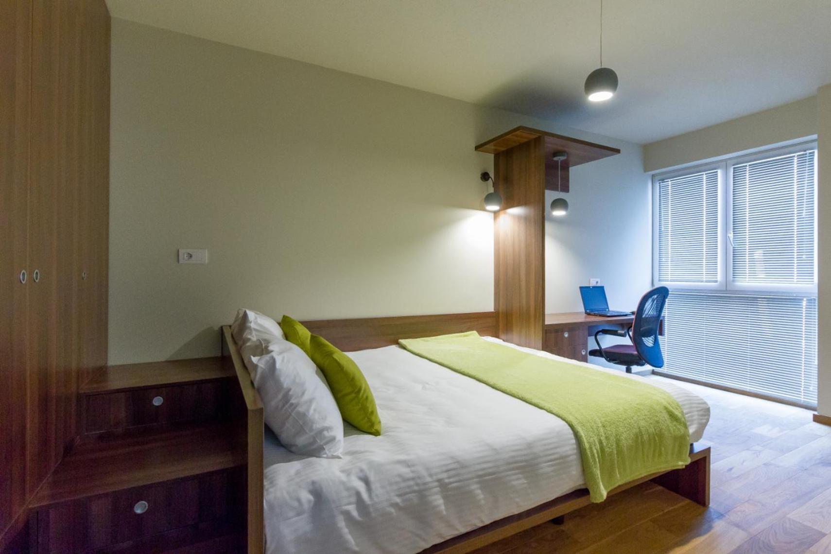My Place Grand Hill Kluž Pokoj fotografie
